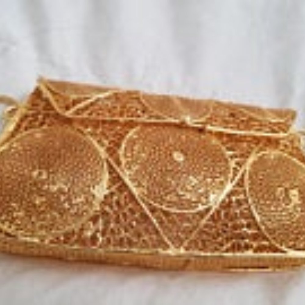 EID. New metal Gold plated carved  purse